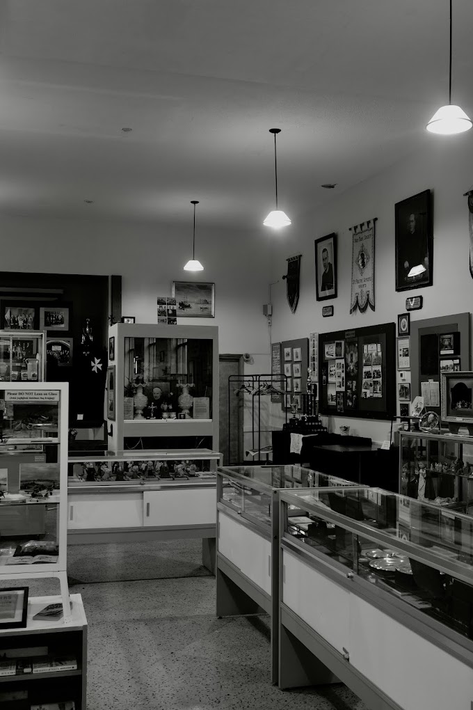 Museum gallery display with Maltese-Canadian heritage objects
